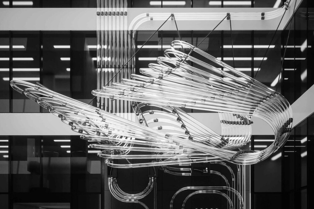 Tubus — sculpture built from functional pneumatic tubing in a building atrium